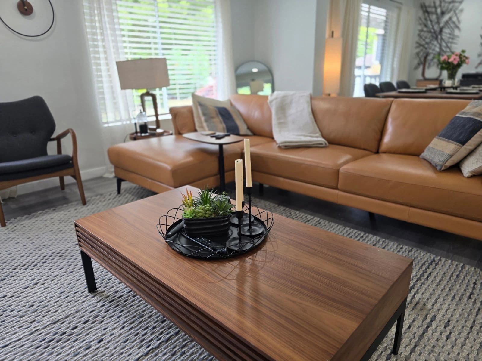 Sunlit shared living room at Normandy Park Adult Family Home